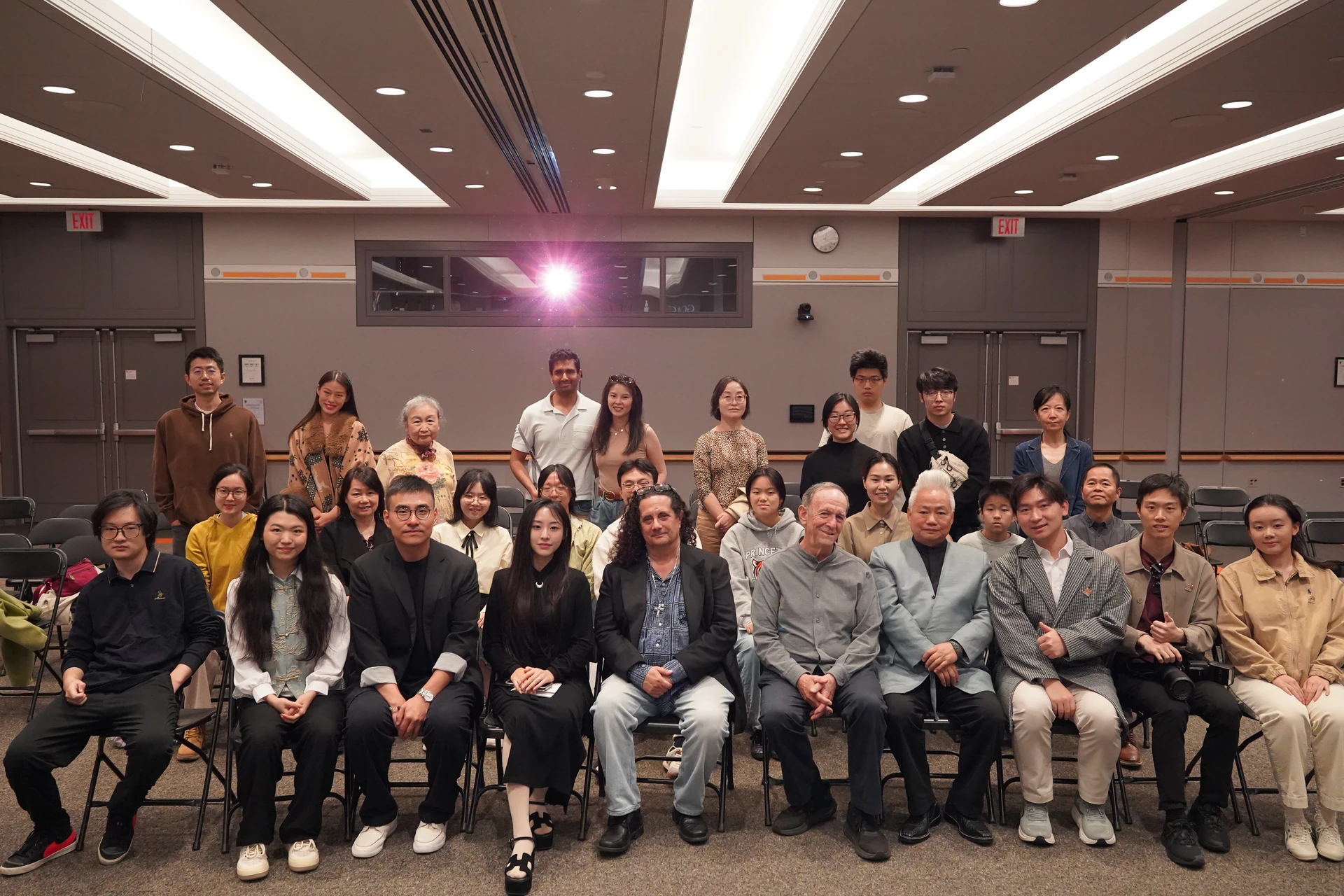 Artists, hosts and participants gathered for a group photograph at Frist Campus Center