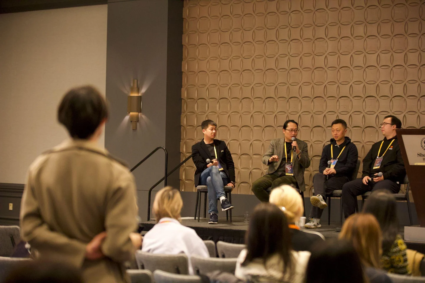 An audience member asks a question during an AMIF live-music panel
